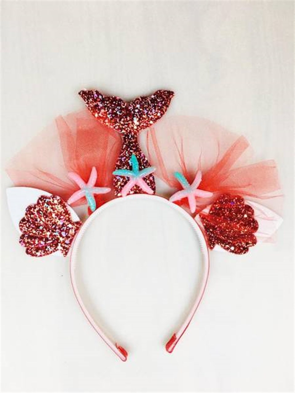 Deniz Kızı, Taç Kırmızı