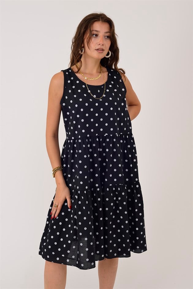 16578 MINNIE PUANTİYE DESEN VOLANLI KOLSUZ KISA ELBİSE