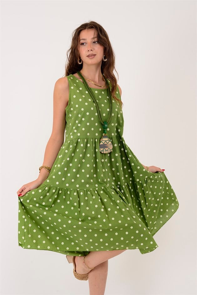 16578 MINNIE PUANTİYE DESEN VOLANLI KOLSUZ KISA ELBİSE