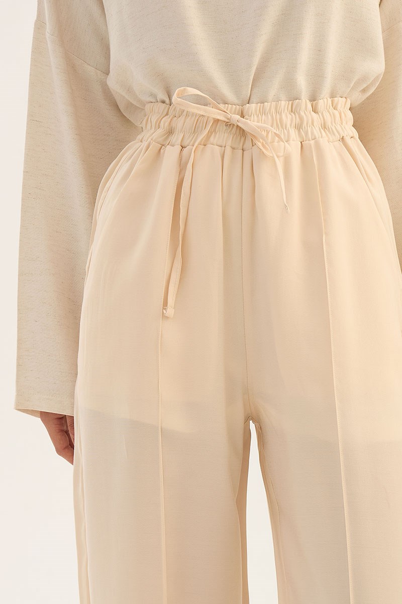 Önü Dikişli Tensel Pantolon Krem