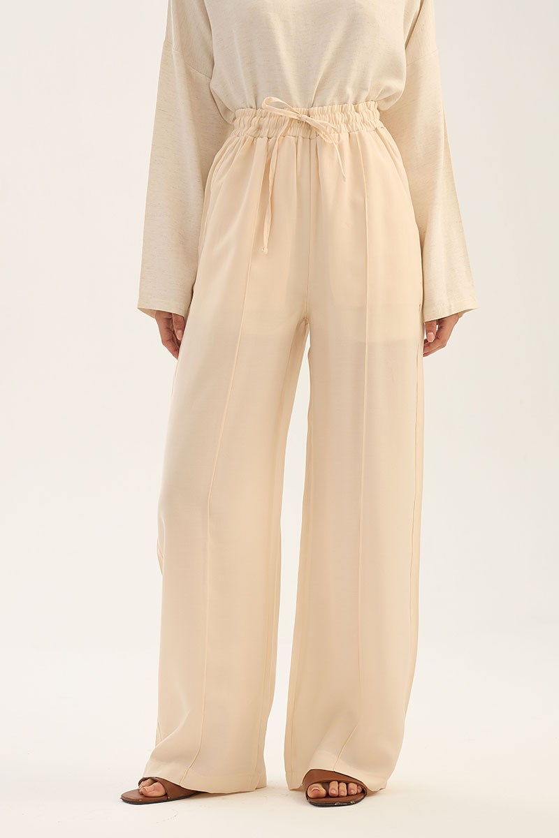 Önü Dikişli Tensel Pantolon Krem