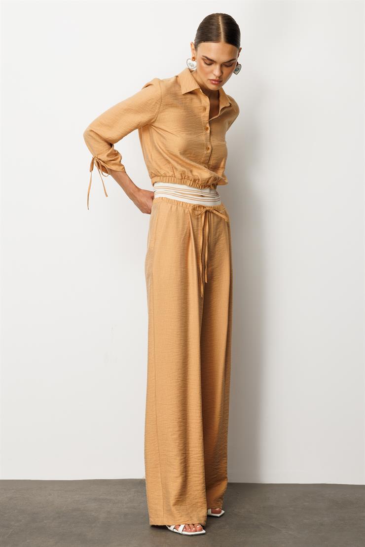 Modailgi  Beli Lastik ve Ribana Detaylı Bol Paça Pileli Yandan Cepli Yüksek Bel Pantolon - 10037 Tarçın