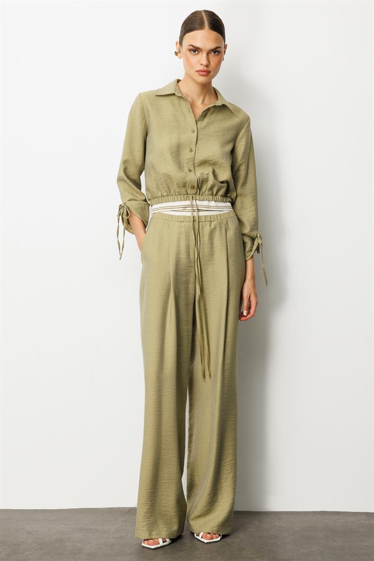 Modailgi  Beli Lastik ve Ribana Detaylı Bol Paça Pileli Yandan Cepli Yüksek Bel Pantolon - 10037 Yağ Yeşili