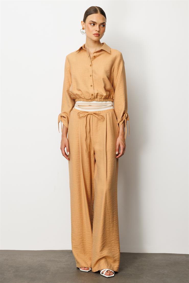 Modailgi  Beli Lastik ve Ribana Detaylı Bol Paça Pileli Yandan Cepli Yüksek Bel Pantolon - 10037 Tarçın