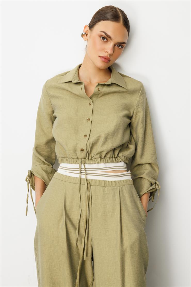 Modailgi  Etek Ucu Lastik ve Ribana Detaylı Bağlamalı Kısa Bluz Gömlek Yağ Yeşili