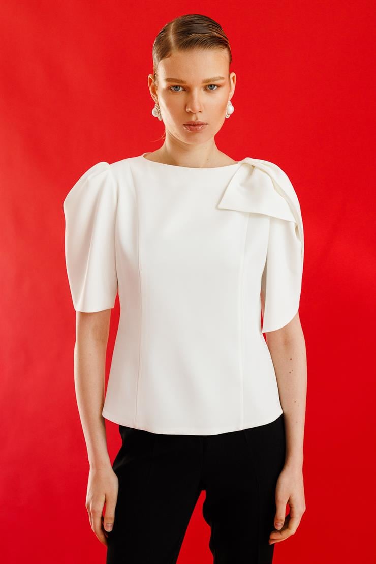 Modailgi  Kolları Pile Fiyonk Anvelop Detaylı Fermuar Kapamalı Bluz Ekru