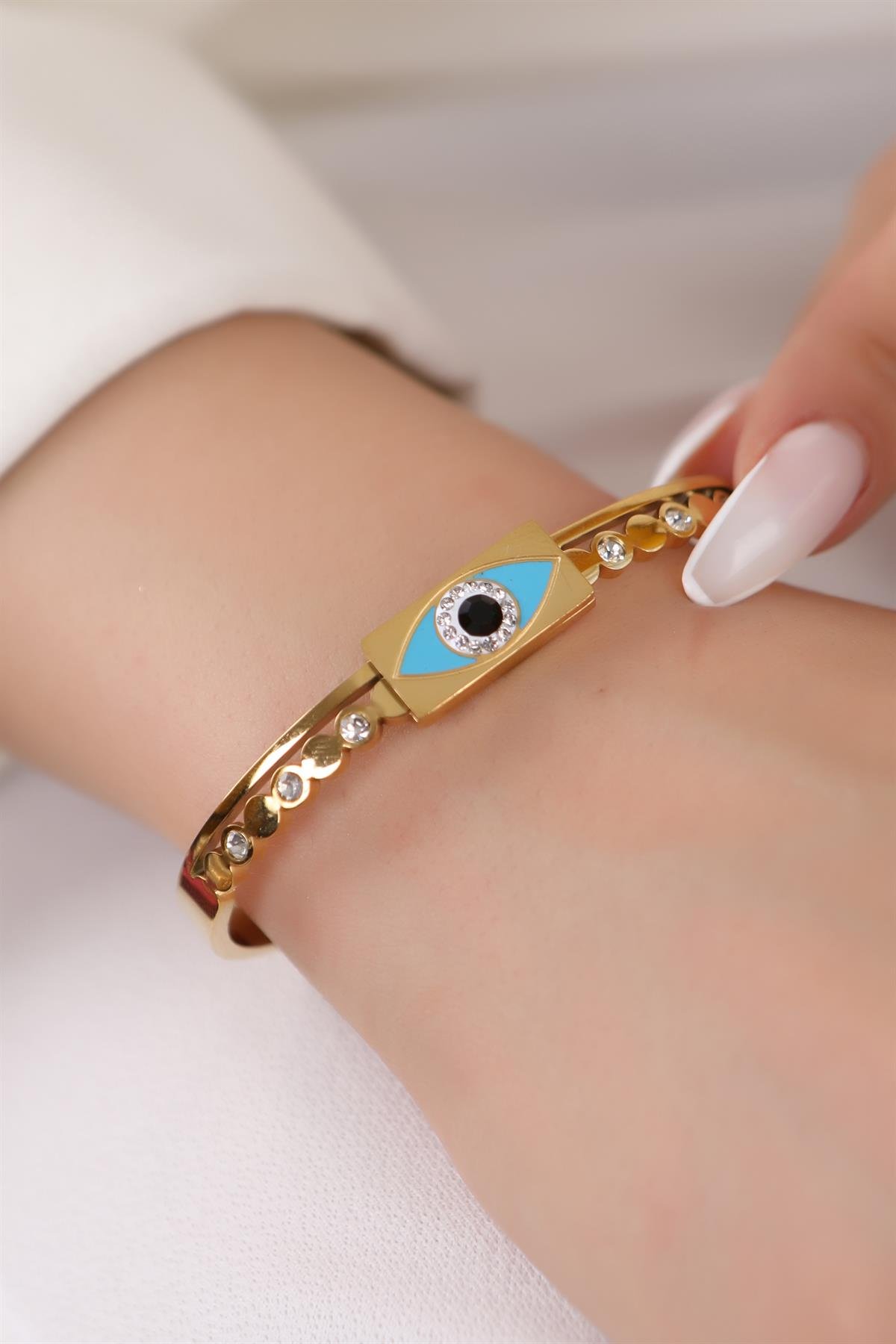 Gold Plated Zircon Stone Eye Detailed Clamp Steel Bracelet