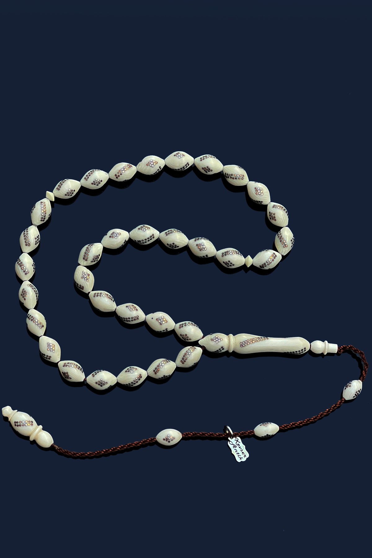 Altın İşlemeli Fildişi TesbihAltın İşlemeli Fildişi Tesbih - Kevser AntikAltın İşlemeli Tesbihler