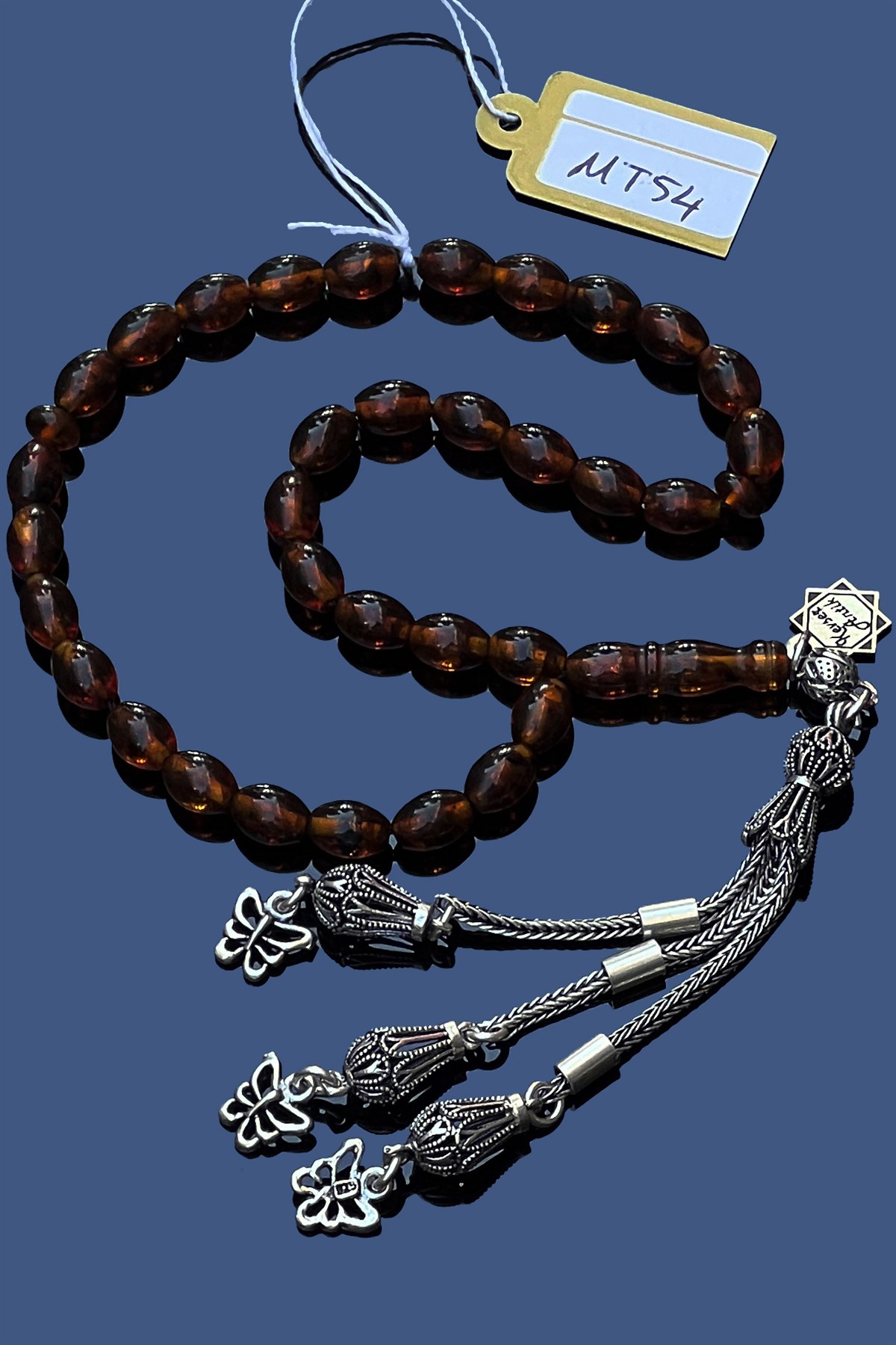 Fosilli Damla Kehribar TesbihFosilli Damla Kehribar Tesbih - Kevser AntikDamla Kehribar Tesbihler