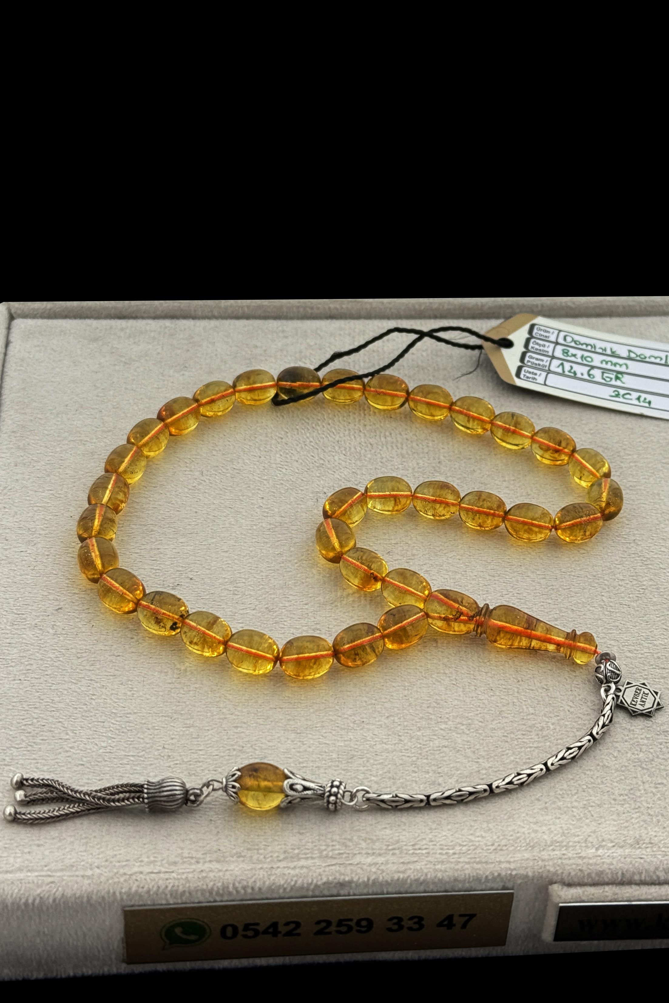 Fosilli Dominik Damla Kehribar TesbihFosilli Dominik Damla Kehribar Tesbih - Kevser AntikDamla Kehribar Tesbihler