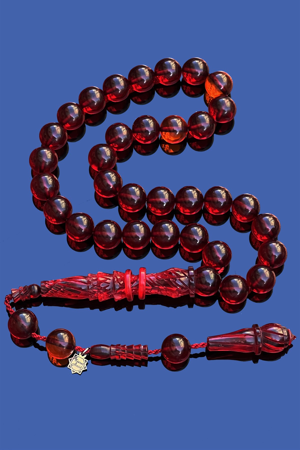 İşçilikli İmameli Kehribar Tesbihİşçilikli İmameli Kehribar Tesbih - Kevser AntikSıkma-Ateş Kehribar Tesbihler