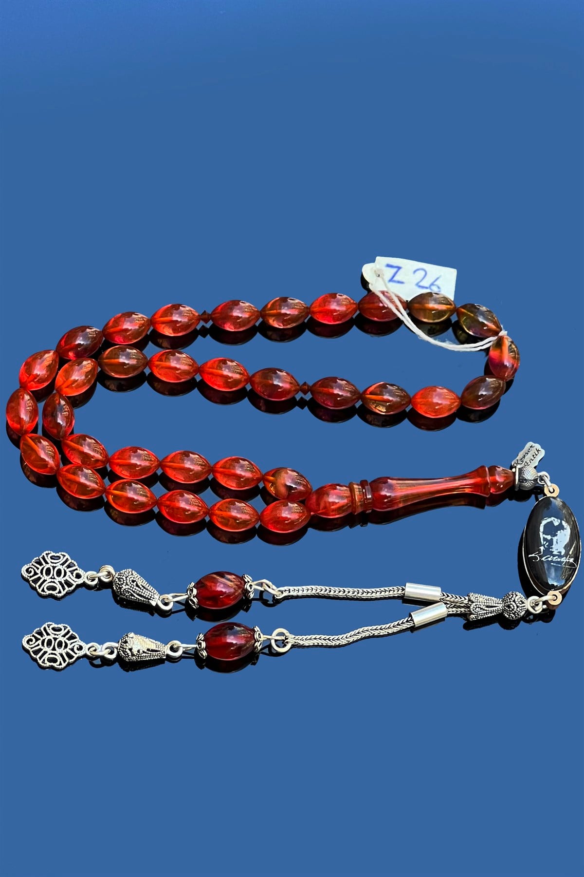 Mor Ateş KehribarMor Ateş Kehribar - Kevser AntikSıkma-Ateş Kehribar Tesbihler