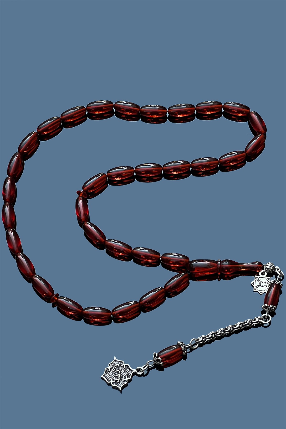 Nar çiçeği Ateş Kehribar TesbihNar çiçeği Ateş Kehribar Tesbih - Kevser AntikSıkma-Ateş Kehribar Tesbihler