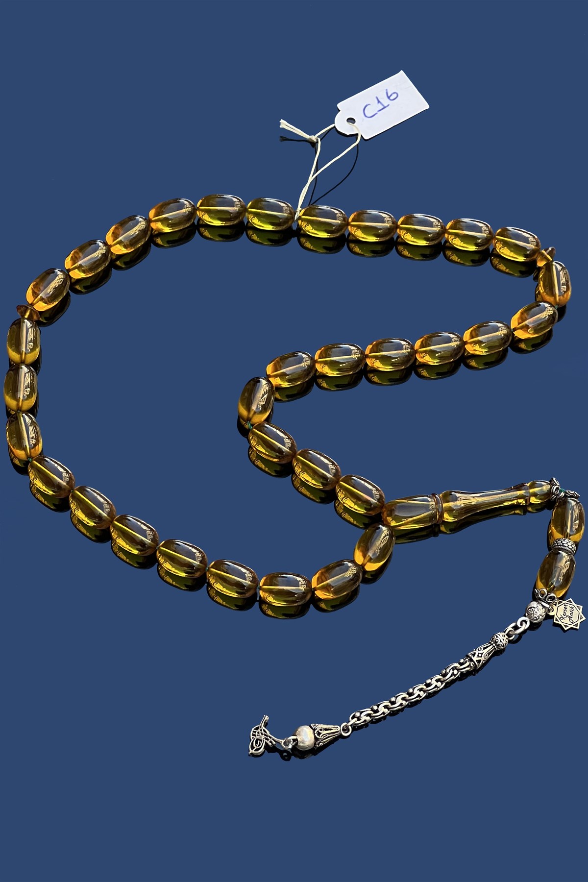 Orman Yeşili Ateş Kehribar TesbihOrman Yeşili Ateş Kehribar Tesbih - Kevser AntikSıkma-Ateş Kehribar Tesbihler