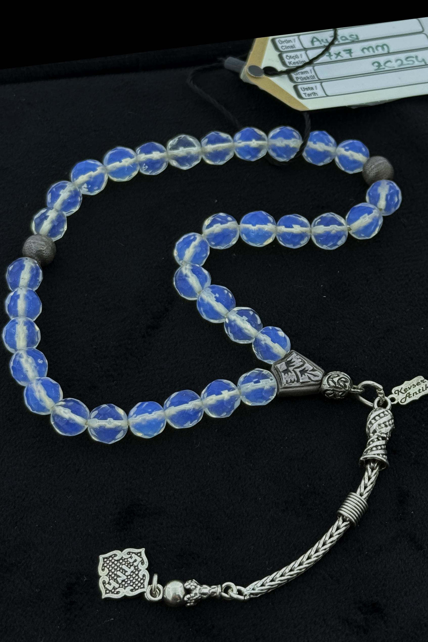 Parlak Beyaz Opal Tonlarında Ay Taşı TesbihParlak Beyaz Opal Tonlarında Ay Taşı Tesbih - Kevser AntikDoğal Taş Tesbihler