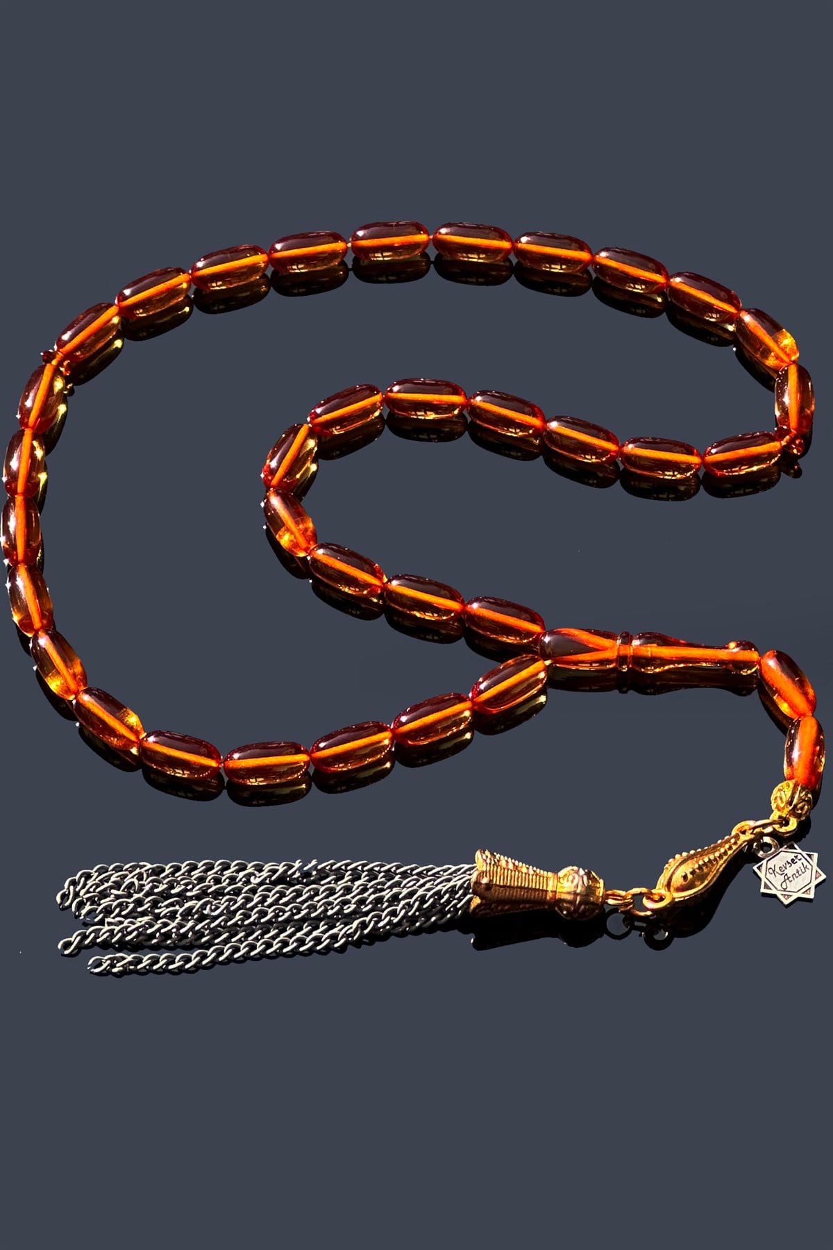 Şenalp Model Ateş Kehribar TesbihŞenalp Model Ateş Kehribar Tesbih - Kevser AntikSıkma-Ateş Kehribar Tesbihler