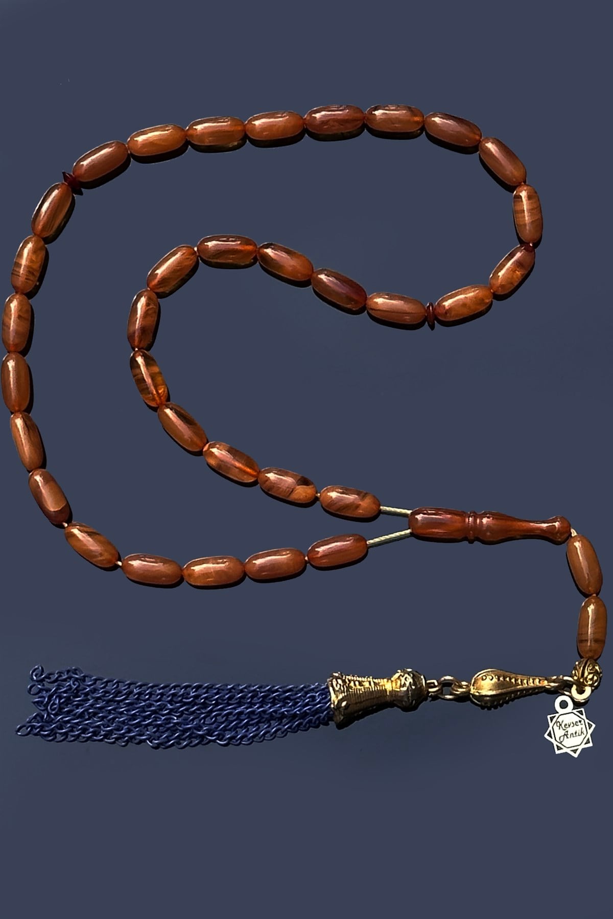 Şenalp Model Sıkma Kehribar TesbihŞenalp Model Sıkma Kehribar Tesbih - Kevser AntikSıkma-Ateş Kehribar Tesbihler