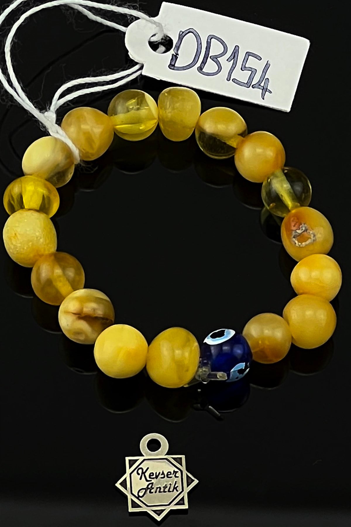 Sertifikalı Ender Bulunan Fosilli Bebek Damla Kehribar BileklikSertifikalı Ender Bulunan Fosilli Bebek Damla Kehribar Bileklik - Kevser AntikKehribar Bileklikler