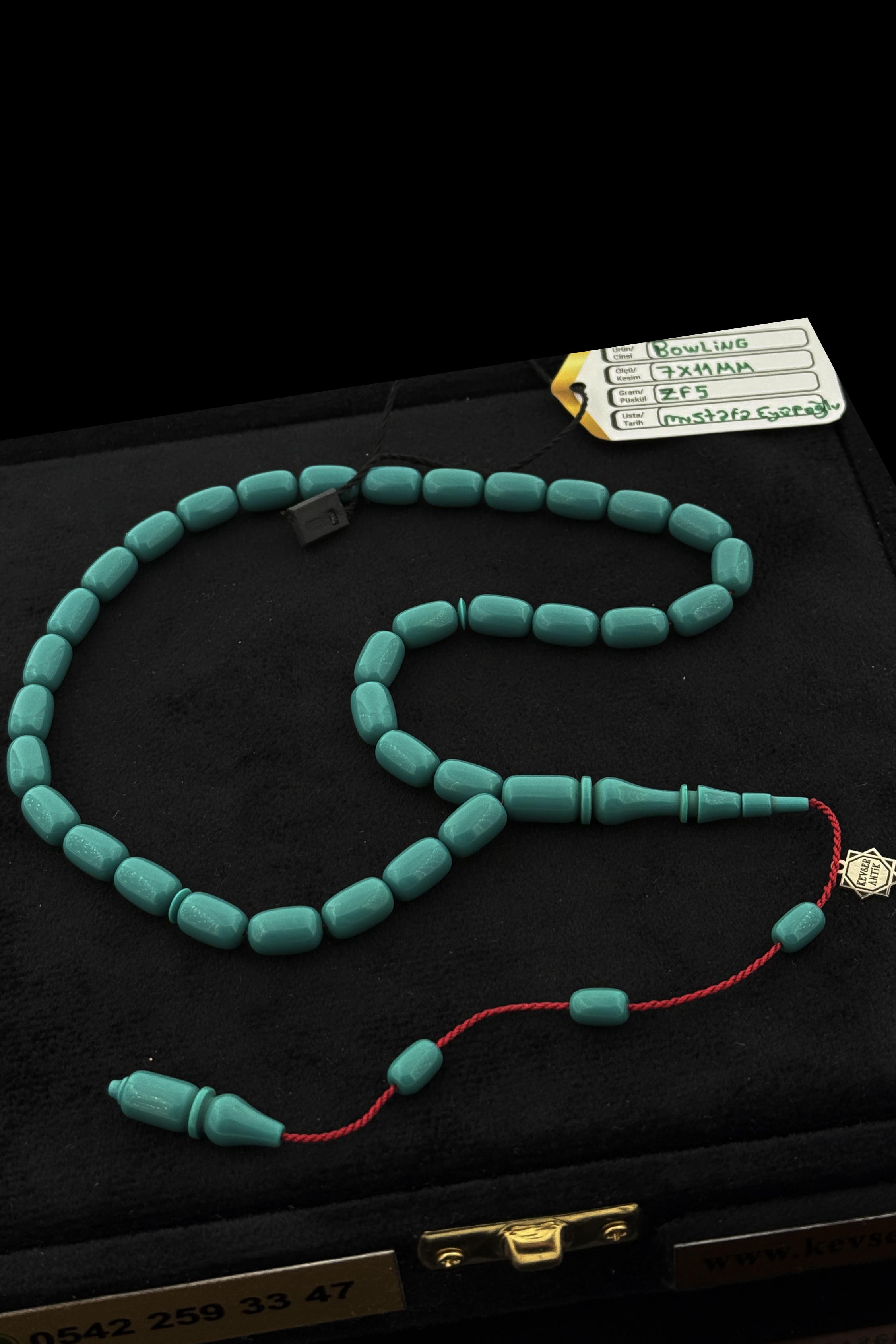 Bowling Topu Katalin TesbihBowling Topu Katalin Tesbih - Kevser AntikOsmanlı Kehribar Tesbihler