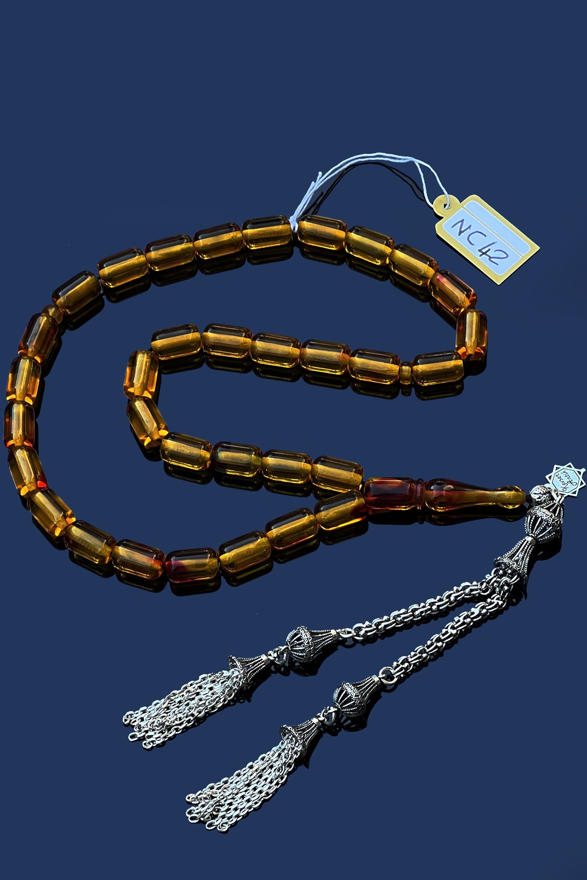 Çift Kamçılı Ateş Kehribar TesbihÇift Kamçılı Ateş Kehribar Tesbih - Kevser AntikSıkma-Ateş Kehribar Tesbihler