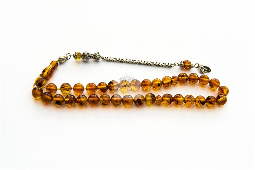 Fosil Parçacıklı Sıkma Kehribar