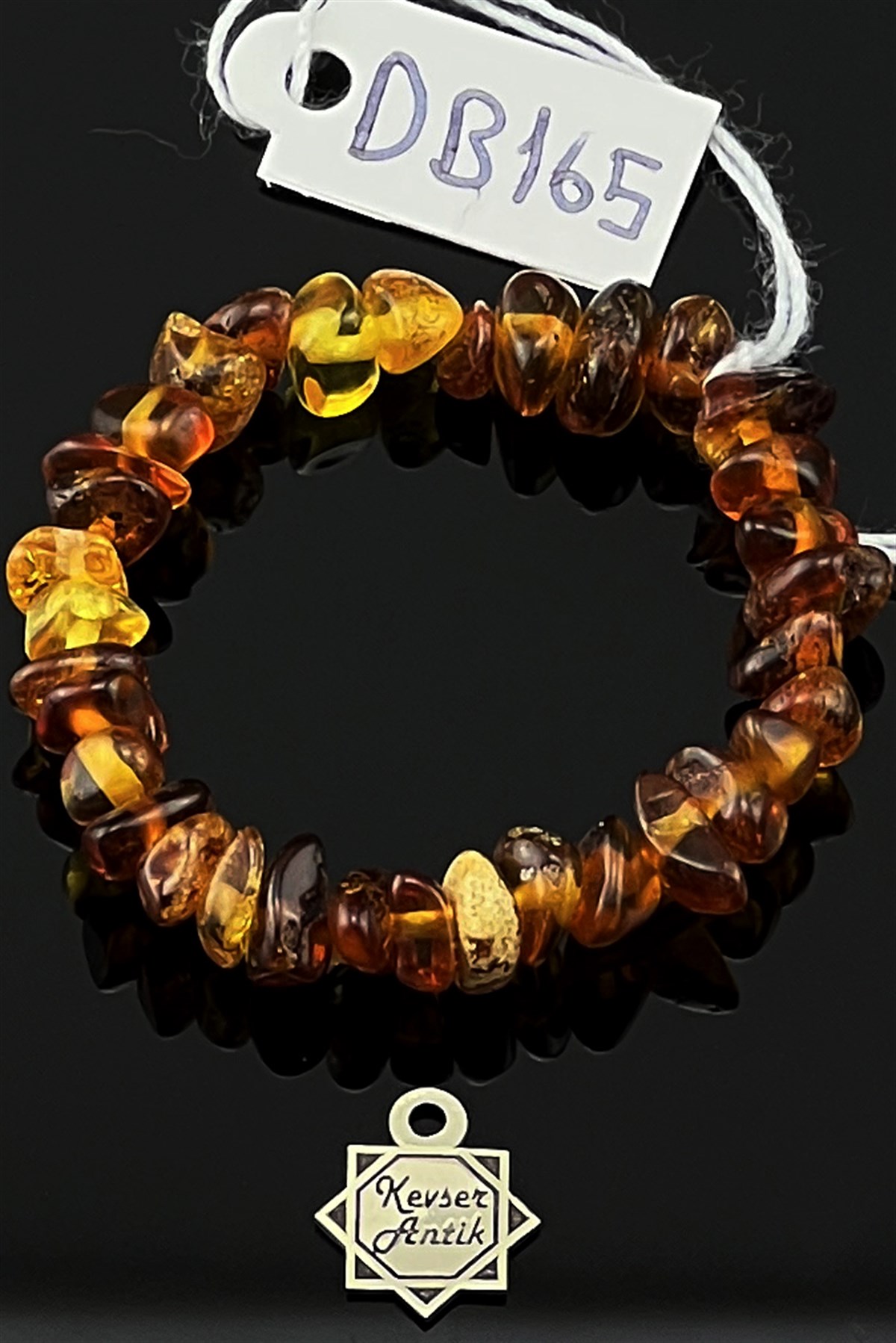 Fosilli Bebek Damla Kehribar BileklikFosilli Bebek Damla Kehribar Bileklik - Kevser AntikKehribar Bileklikler