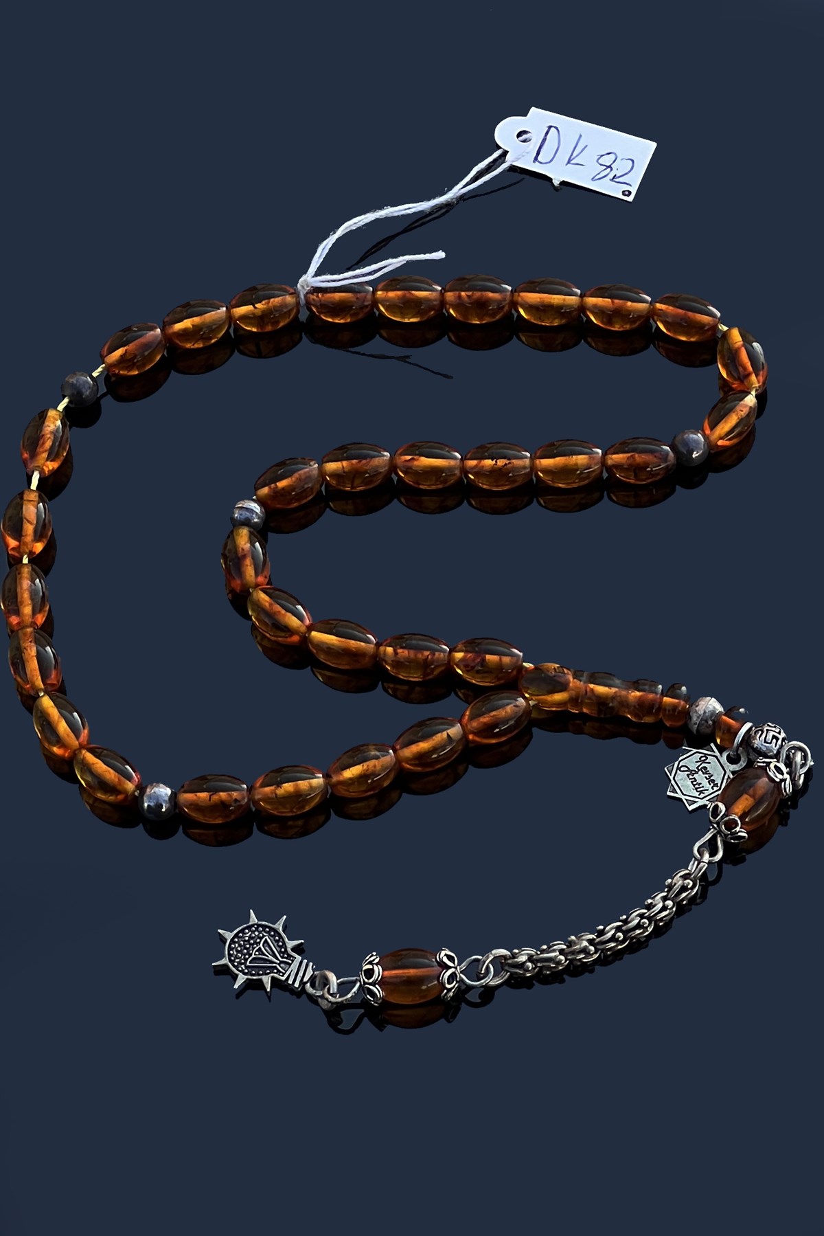 Fosilli Damla Kehribar TesbihFosilli Damla Kehribar Tesbih - Kevser AntikDamla Kehribar Tesbihler