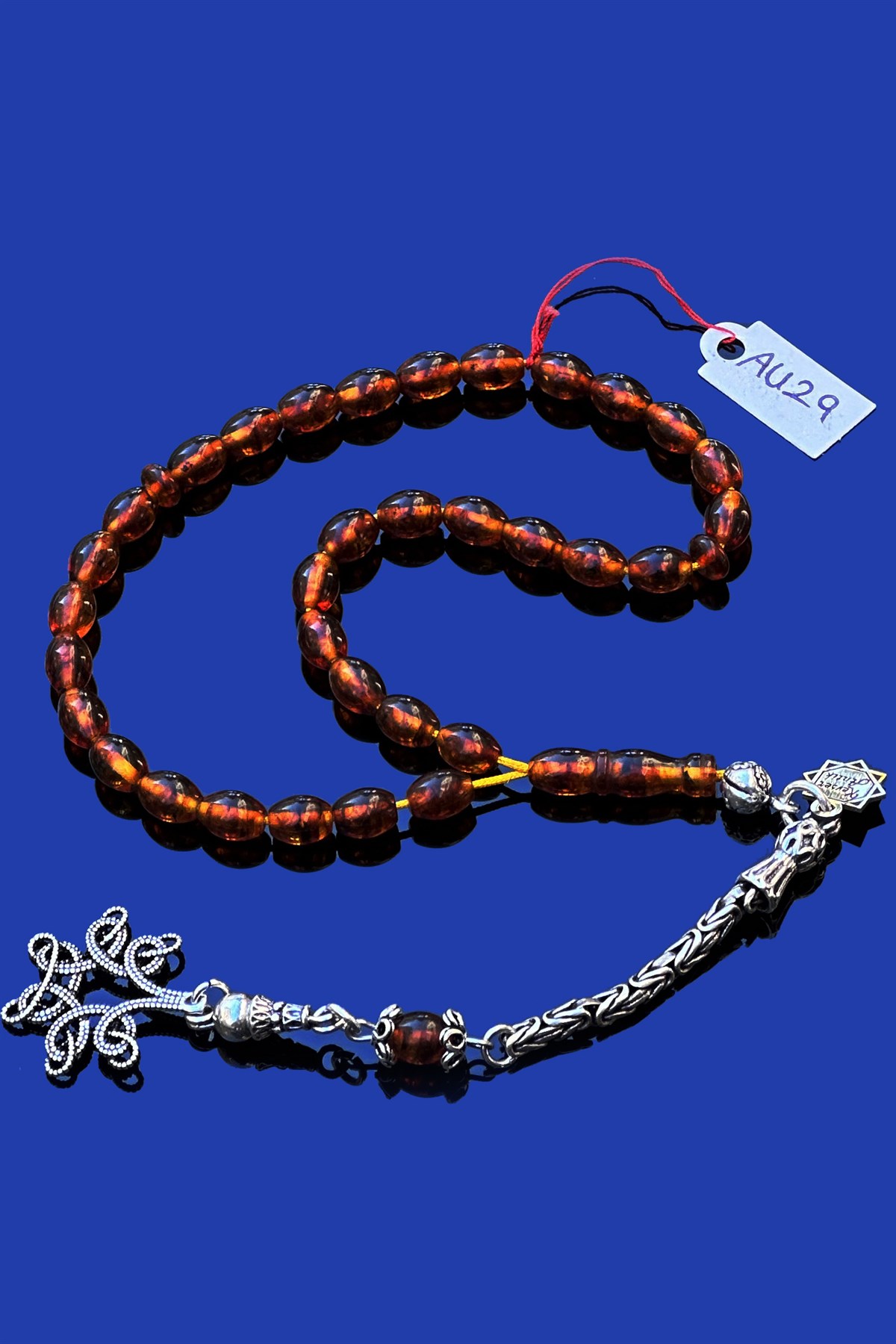 Fosilli Damla Kehribar TesbihFosilli Damla Kehribar Tesbih - Kevser AntikDamla Kehribar Tesbihler