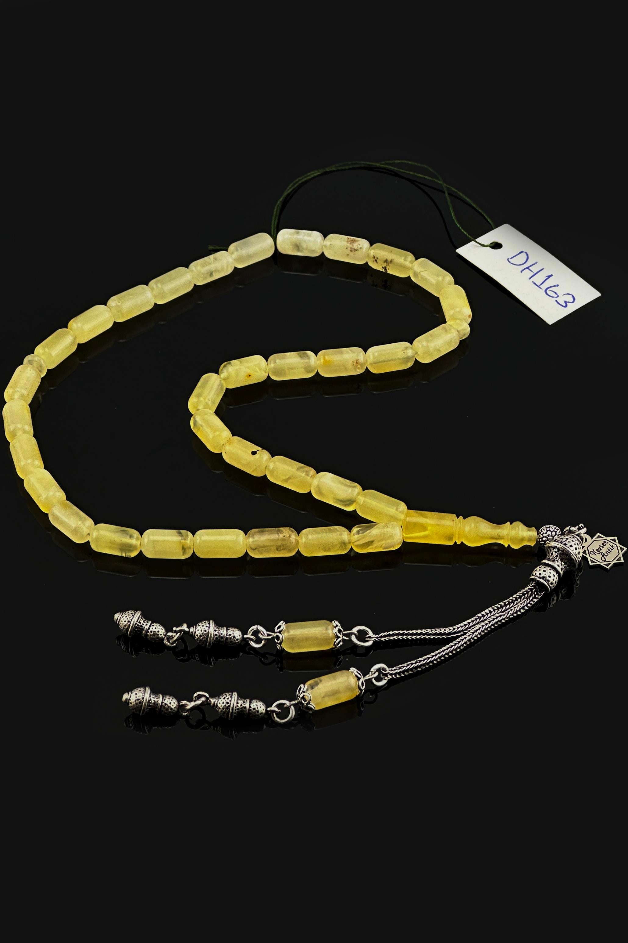 Fosilli Damla Kehribar TesbihFosilli Damla Kehribar Tesbih - Kevser AntikDamla Kehribar Tesbihler