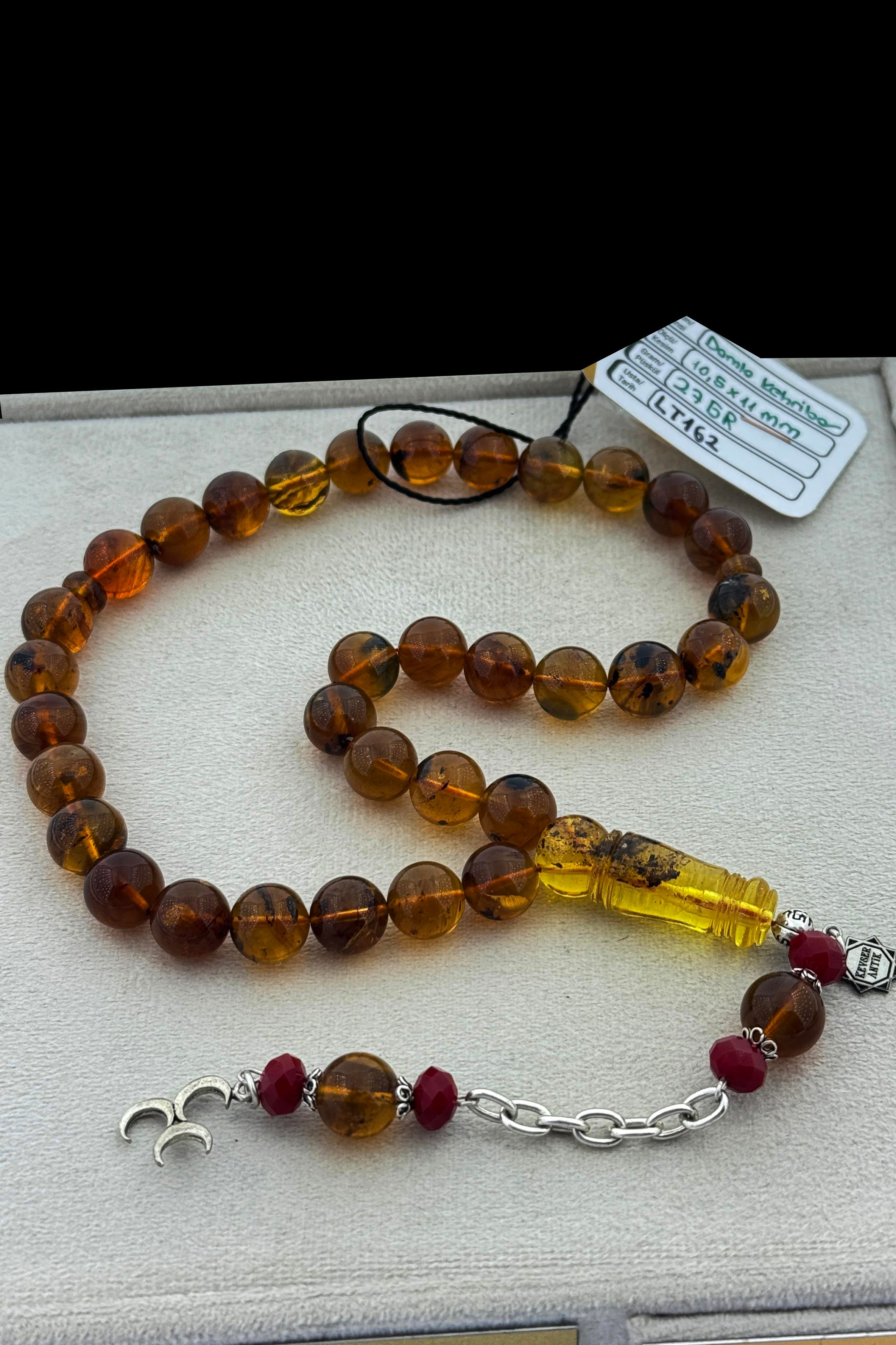 Fosilli Dominik Amber Tesbih – Sertifikalı KoleksiyonFosilli Dominik Amber Tesbih – Sertifikalı Koleksiyon - Kevser AntikDamla Kehribar Tesbihler