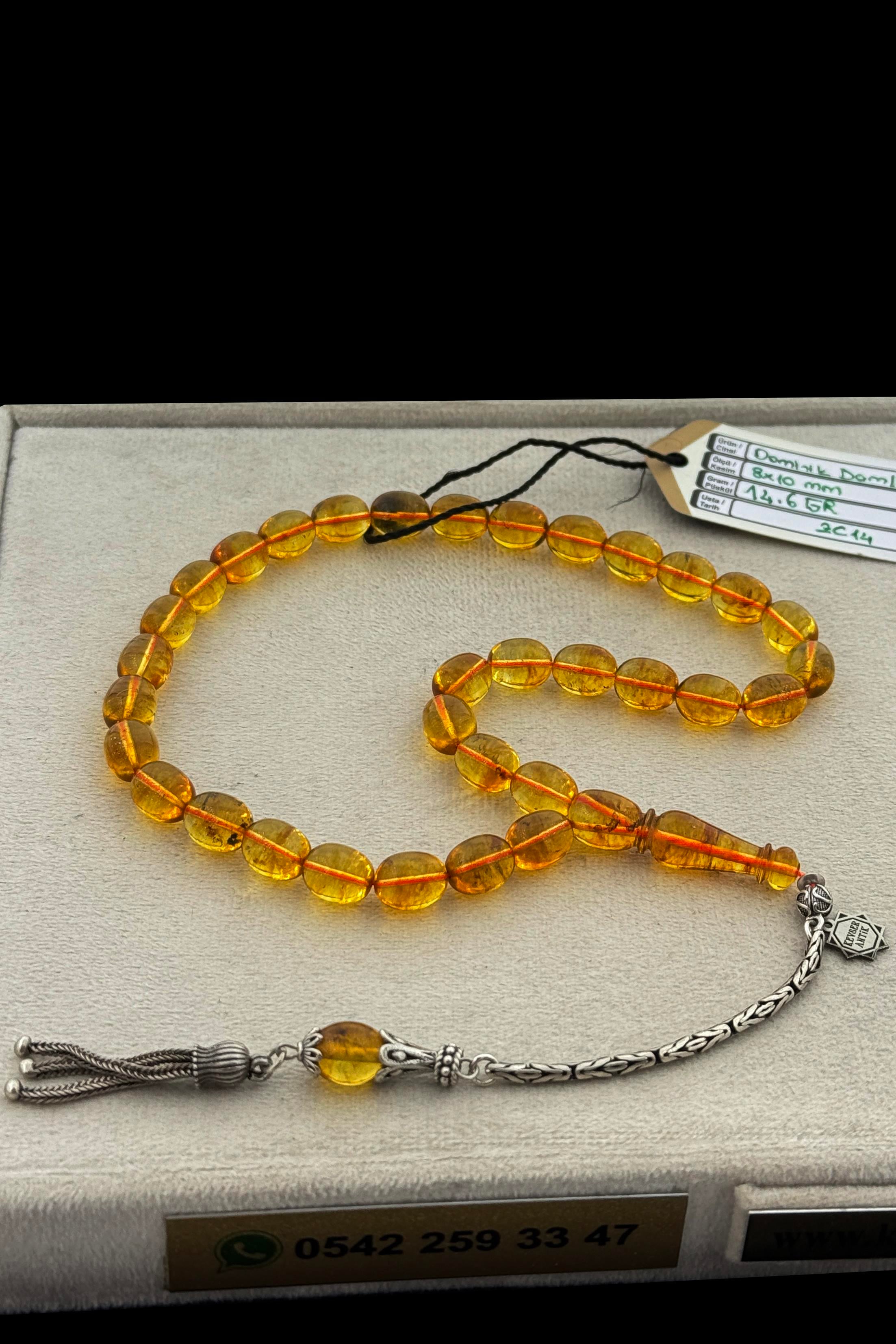 Fosilli Dominik Damla Kehribar TesbihFosilli Dominik Damla Kehribar Tesbih - Kevser AntikDamla Kehribar Tesbihler