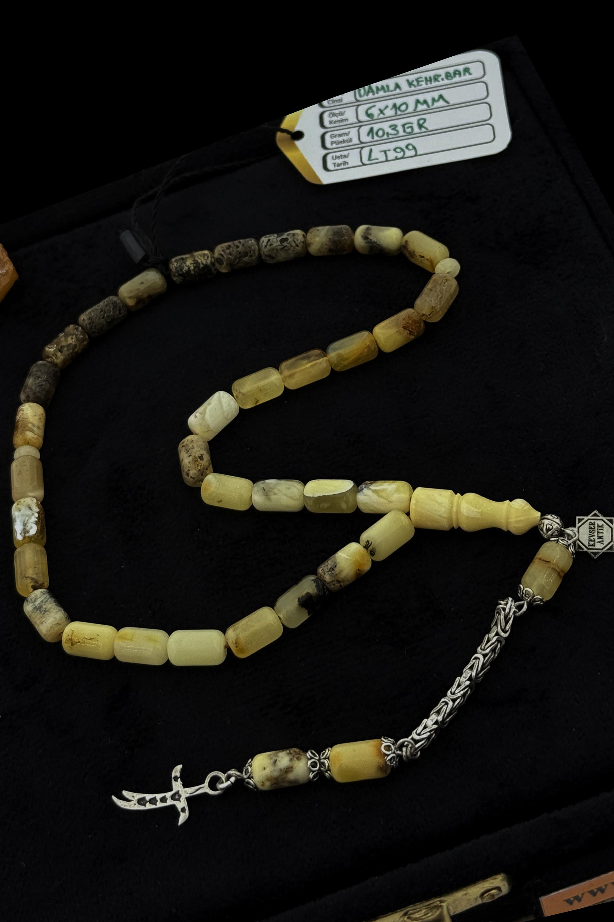 Fosilli Mat Damla Kehribar TesbihFosilli Mat Damla Kehribar Tesbih - Kevser AntikDamla Kehribar Tesbihler