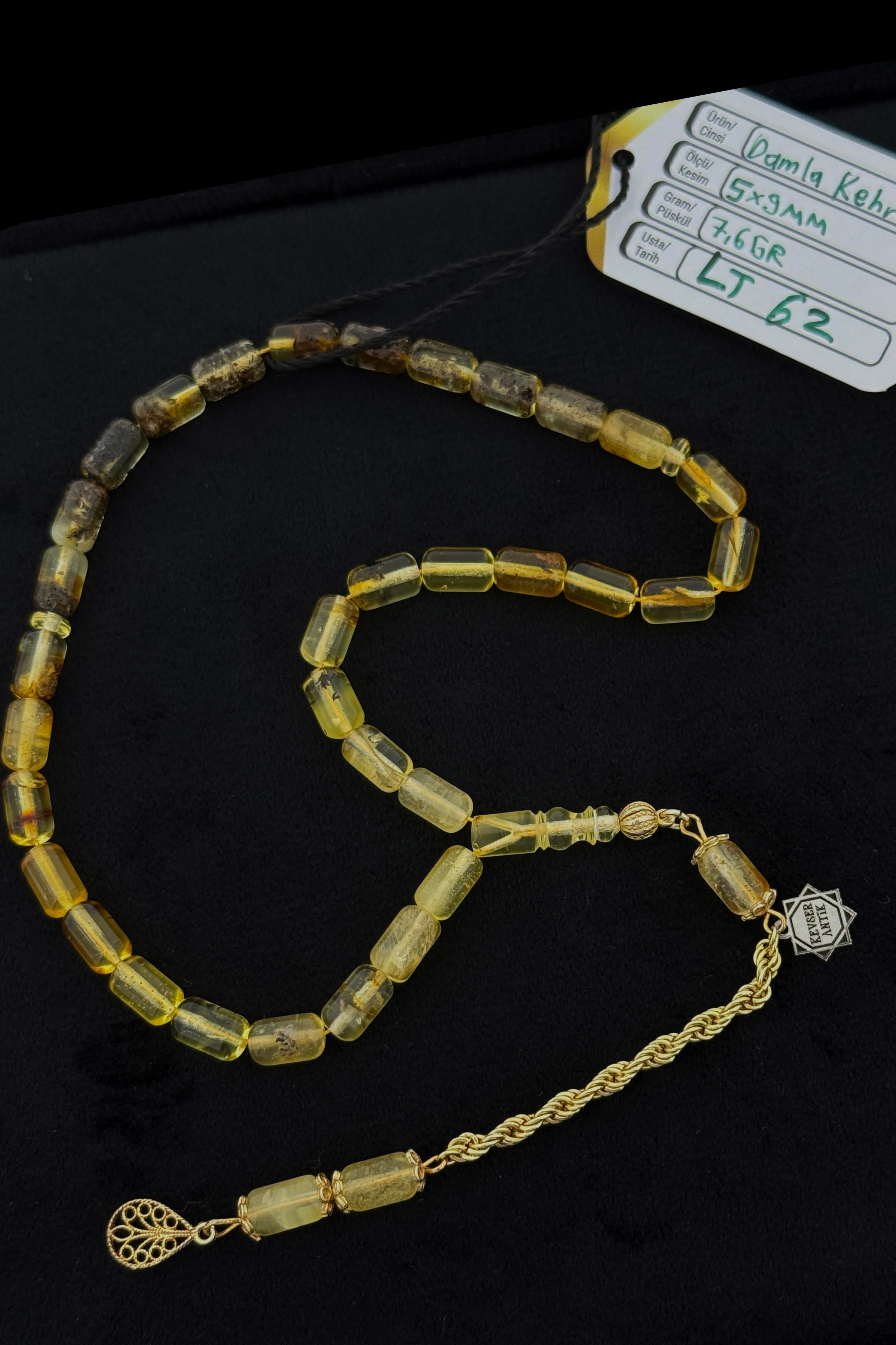 Fosilli Şeffaf Damla Kehribar Tesbih – KoleksiyonlukFosilli Şeffaf Damla Kehribar Tesbih – Koleksiyonluk - Kevser AntikDamla Kehribar Tesbihler