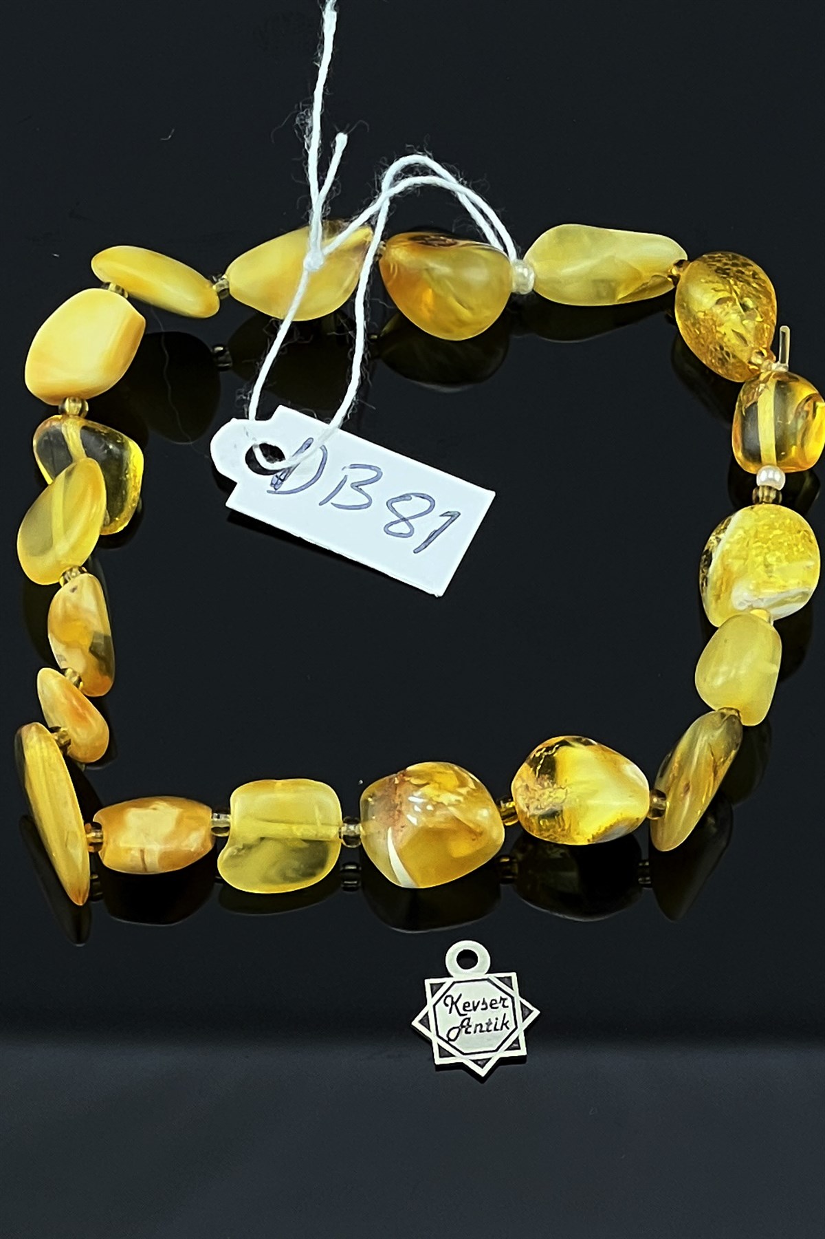 Fosilli Ukranya BileklikFosilli Ukranya Bileklik - Kevser AntikKehribar Bileklikler