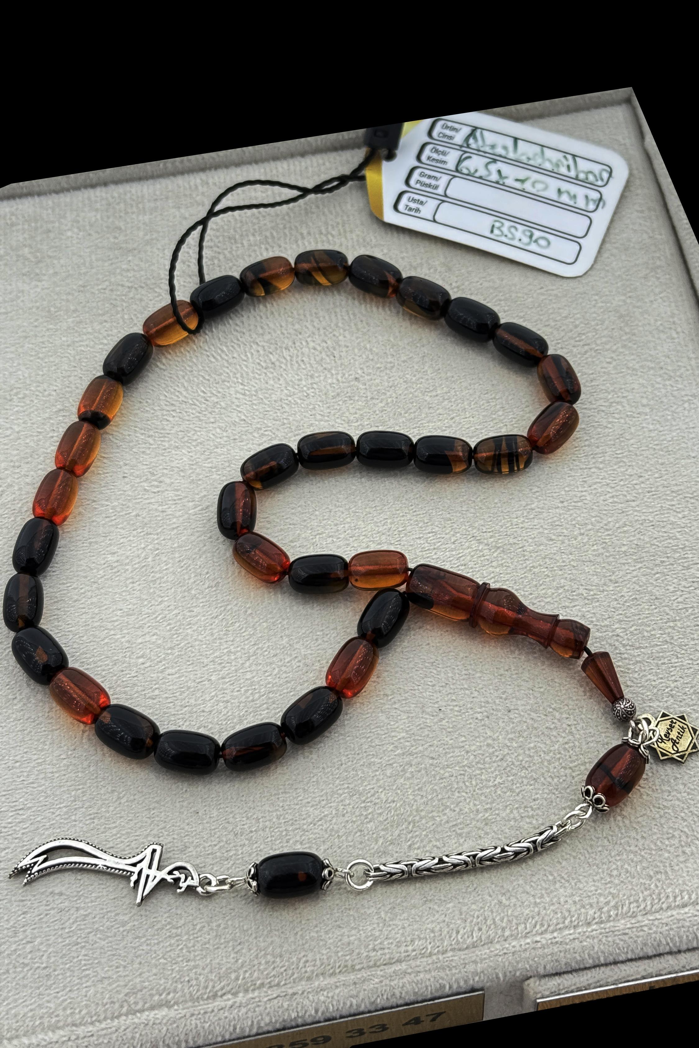 Geçiş Renkleriyle Dikkat Çeken SıkmaGeçiş Renkleriyle Dikkat Çeken Sıkma - Kevser AntikSıkma-Ateş Kehribar Tesbihler