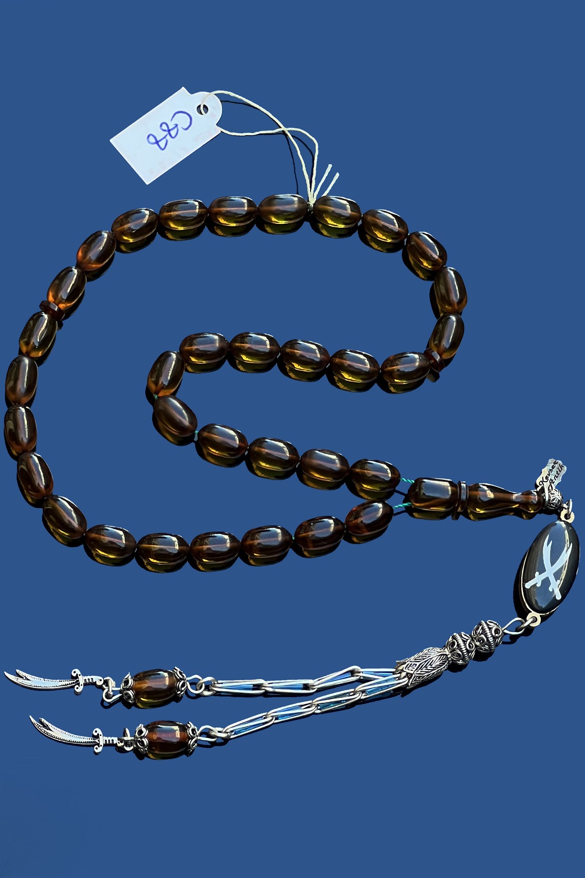 Kapsül Ateş KehribarKapsül Ateş Kehribar - Kevser AntikSıkma-Ateş Kehribar Tesbihler