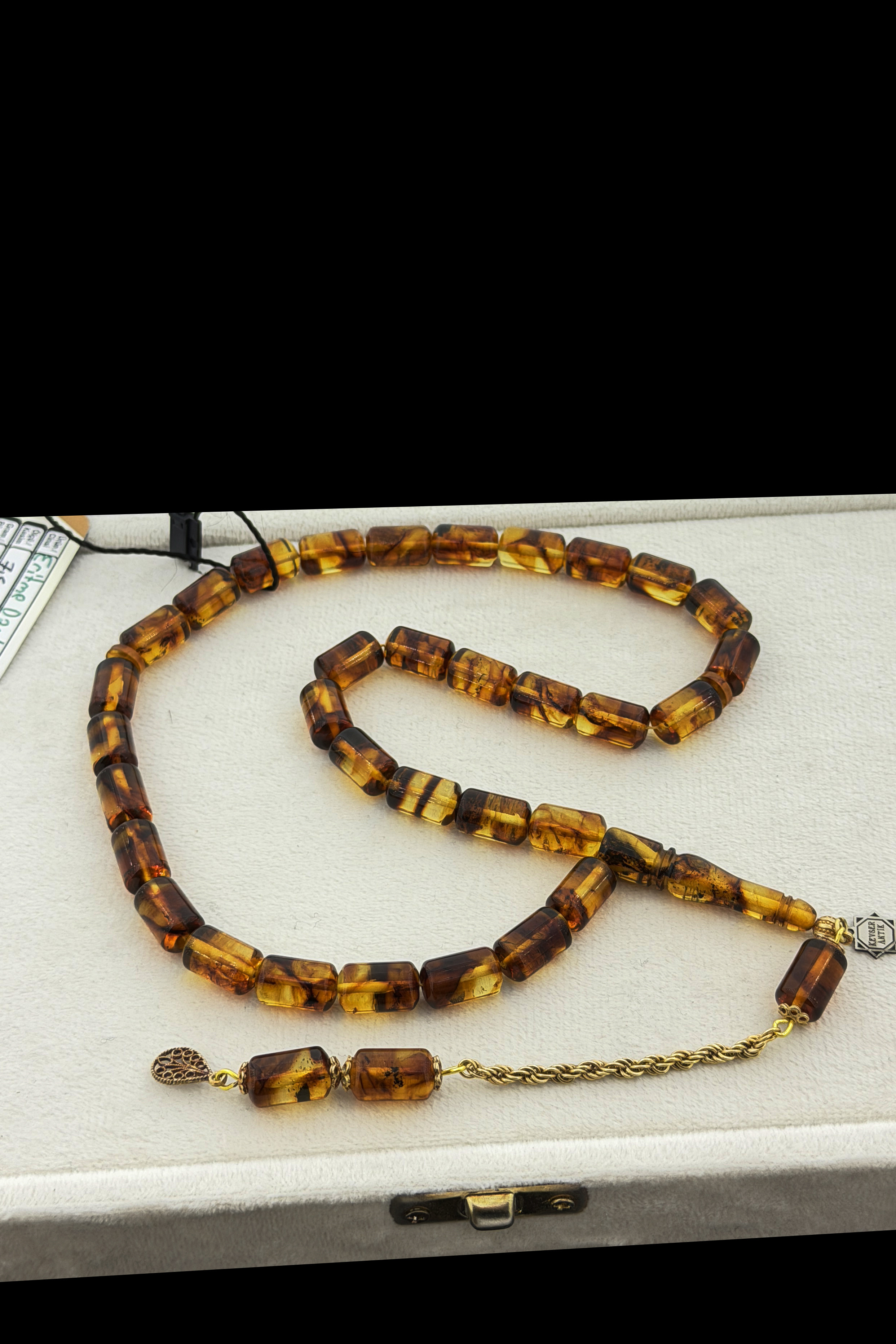 Kapsül Kesim Damla Kehribar TesbihKapsül Kesim Damla Kehribar Tesbih - Kevser AntikDamla Kehribar Tesbihler