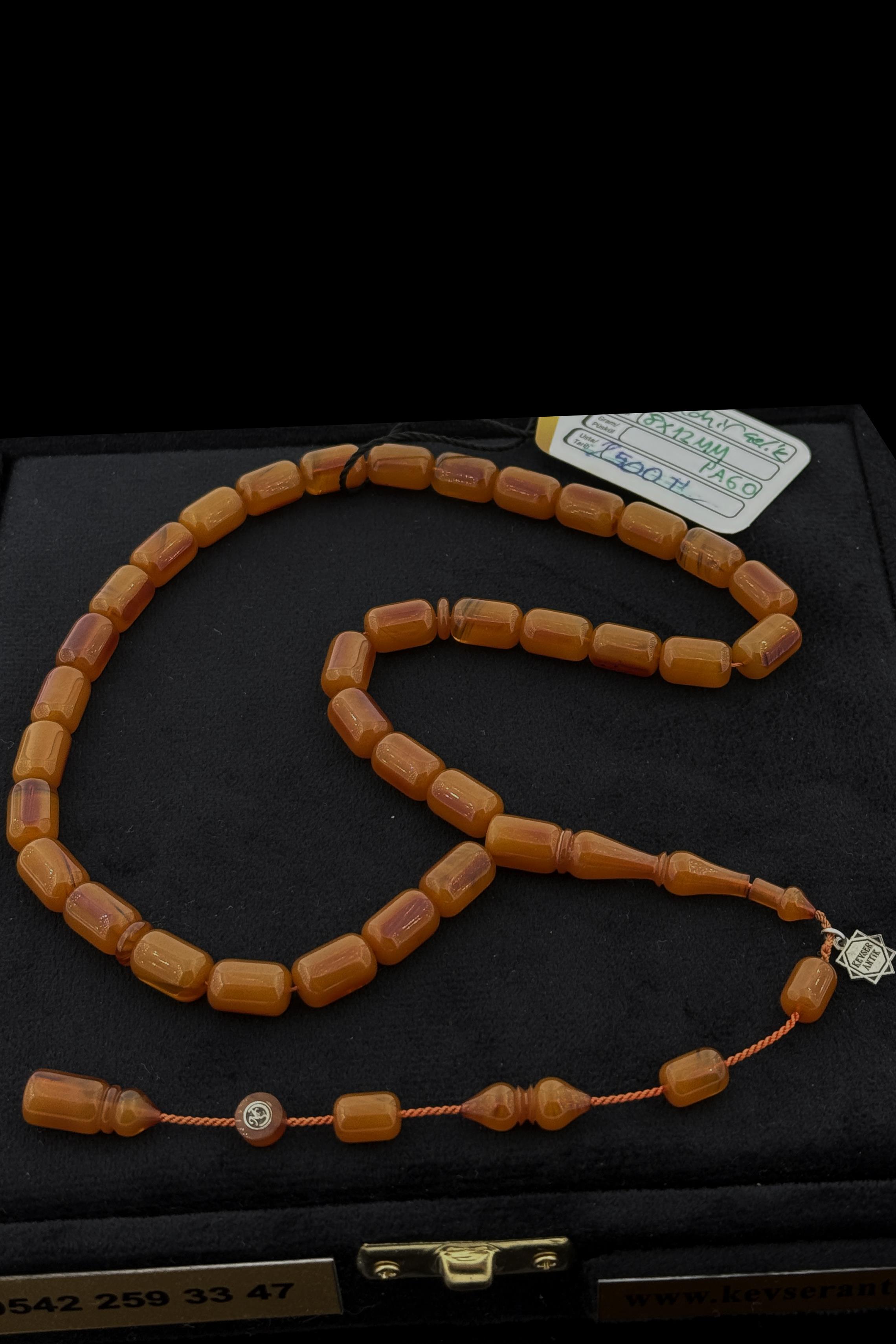 Mahir Çelik Eski Teker Sıkma TesbihMahir Çelik Eski Teker Sıkma Tesbih - Kevser AntikOsmanlı Kehribar Tesbihler