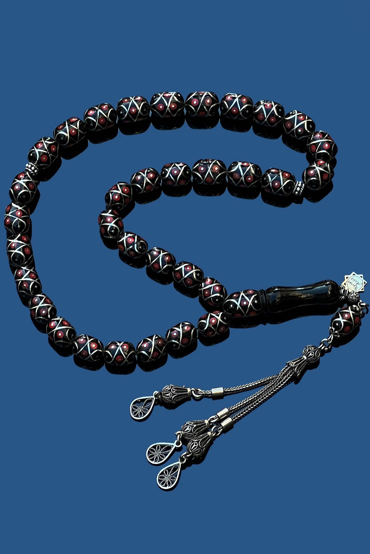 Mercan İşlemeli Oltu Taşı TesbihMercan İşlemeli Oltu Taşı Tesbih - Kevser AntikGümüş İşlemeli Tesbihler