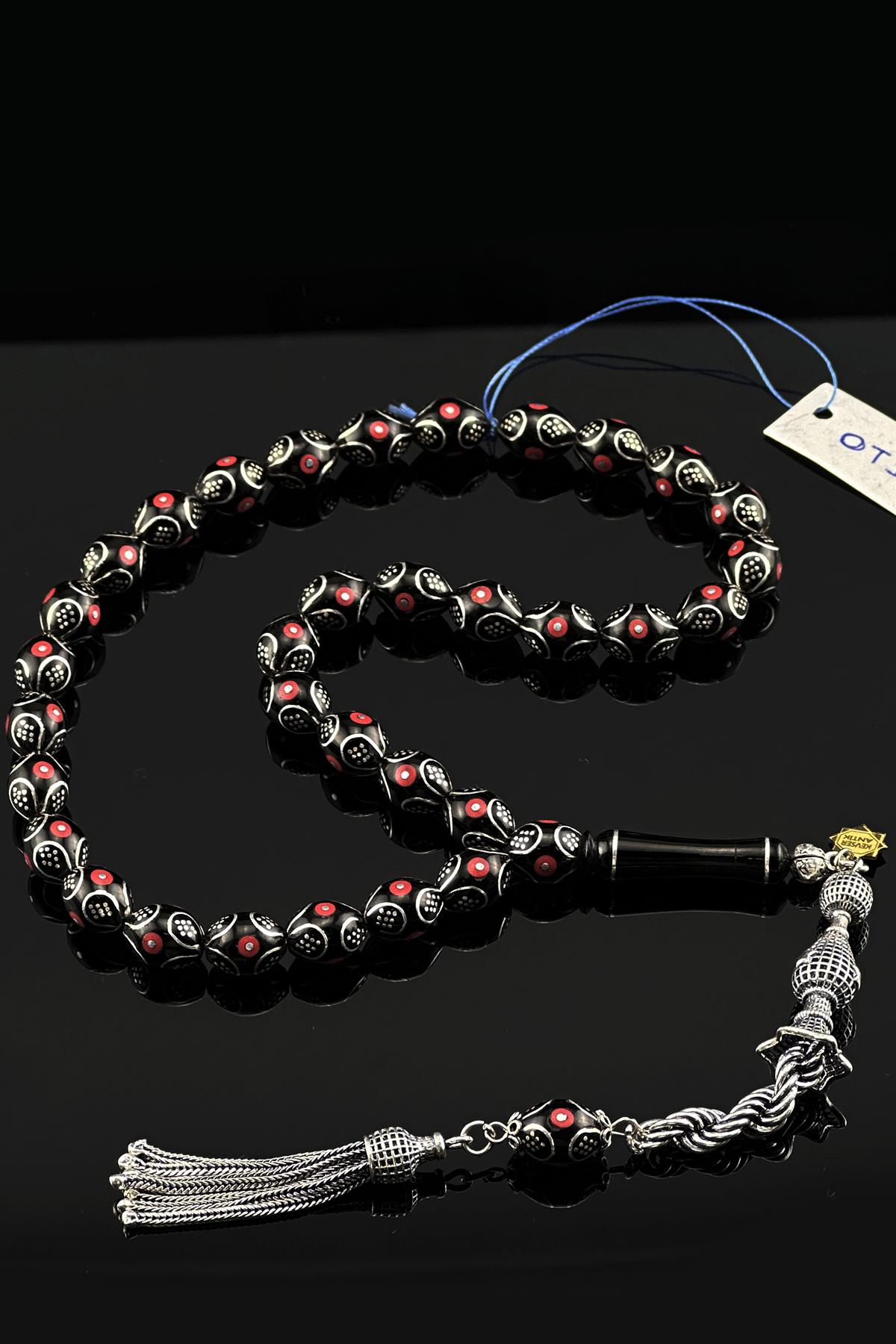 Mercan İşlemeli Oltu Taşı TesbihMercan İşlemeli Oltu Taşı Tesbih - Kevser AntikGümüş İşlemeli Tesbihler