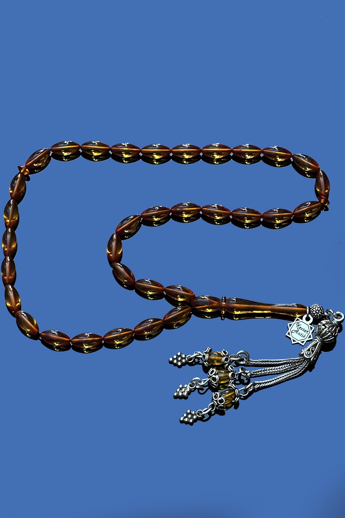 Mini Ateş KehribarMini Ateş Kehribar - Kevser AntikSıkma-Ateş Kehribar Tesbihler