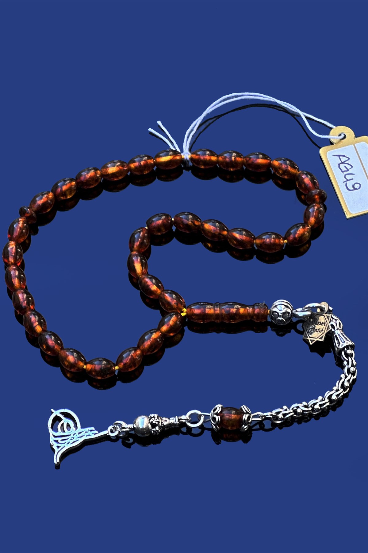 Mini Fosilli Damla Kehribar TesbihMini Fosilli Damla Kehribar Tesbih - Kevser AntikDamla Kehribar Tesbihler