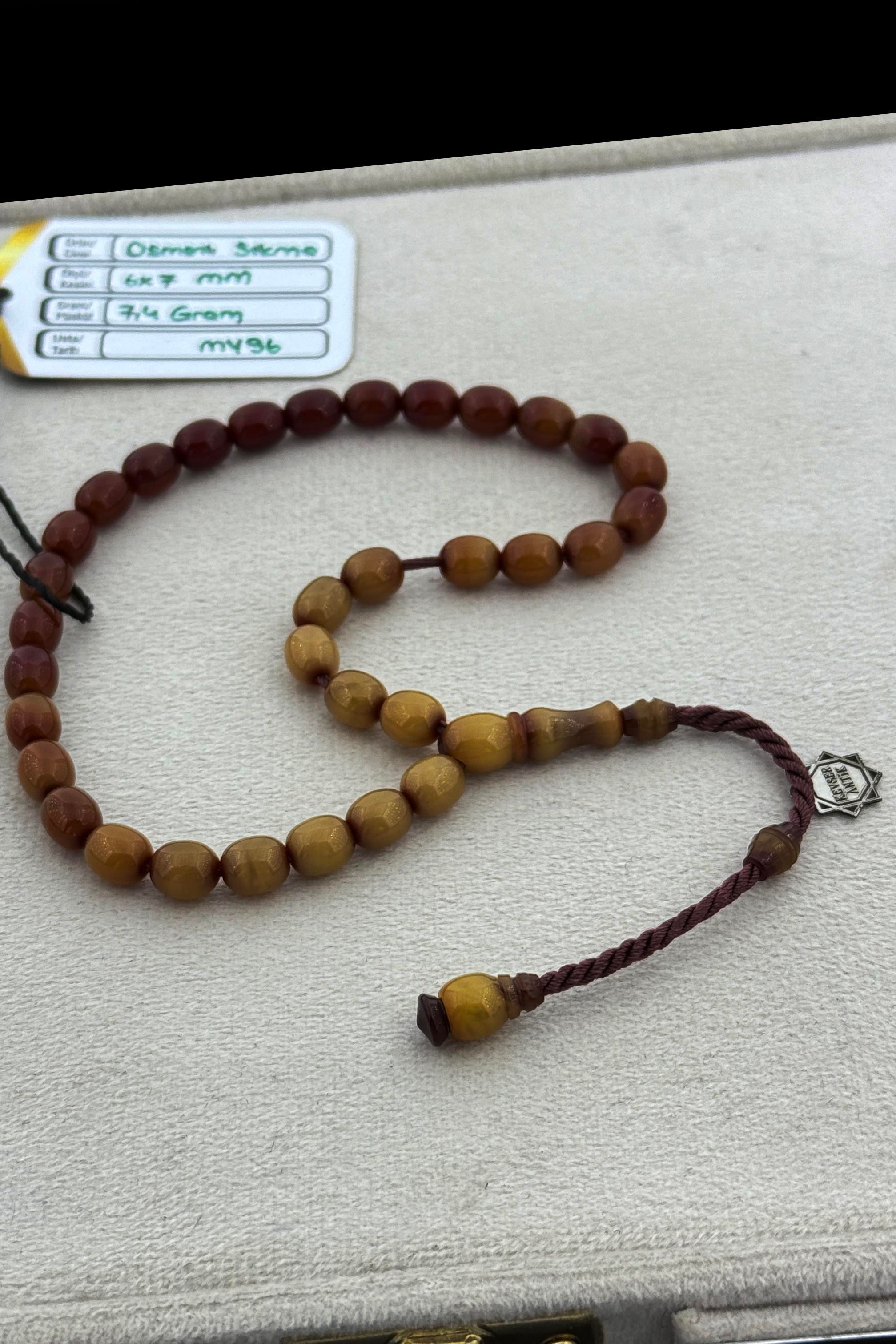 Mini Traşlı Osmanlı Sıkma TesbihMini Traşlı Osmanlı Sıkma Tesbih - Kevser AntikOsmanlı Kehribar Tesbihler