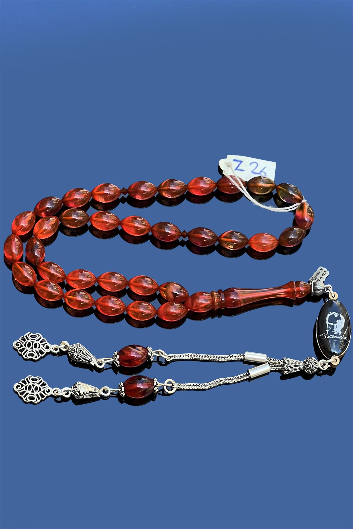 Mor Ateş KehribarMor Ateş Kehribar - Kevser AntikSıkma-Ateş Kehribar Tesbihler