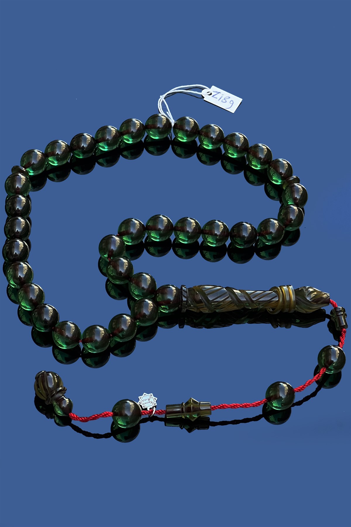 Özel İşçilikli Ateş Kehribar TesbihÖzel İşçilikli Ateş Kehribar Tesbih - Kevser AntikÖZEL SERİ TESBİHLER