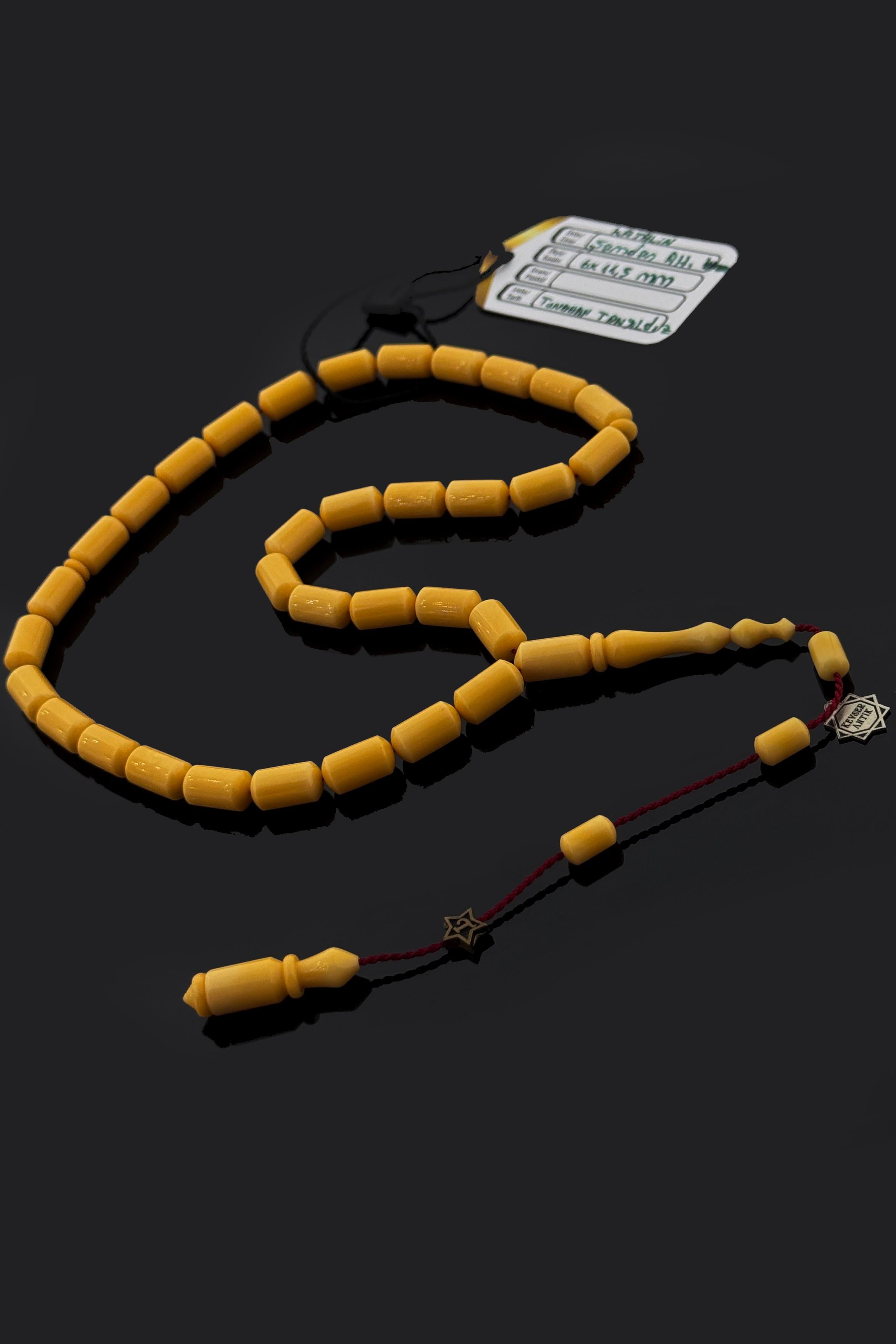 Şamdan Altı Objeden Katalin TesbihŞamdan Altı Objeden Katalin Tesbih - Kevser AntikOsmanlı Kehribar Tesbihler