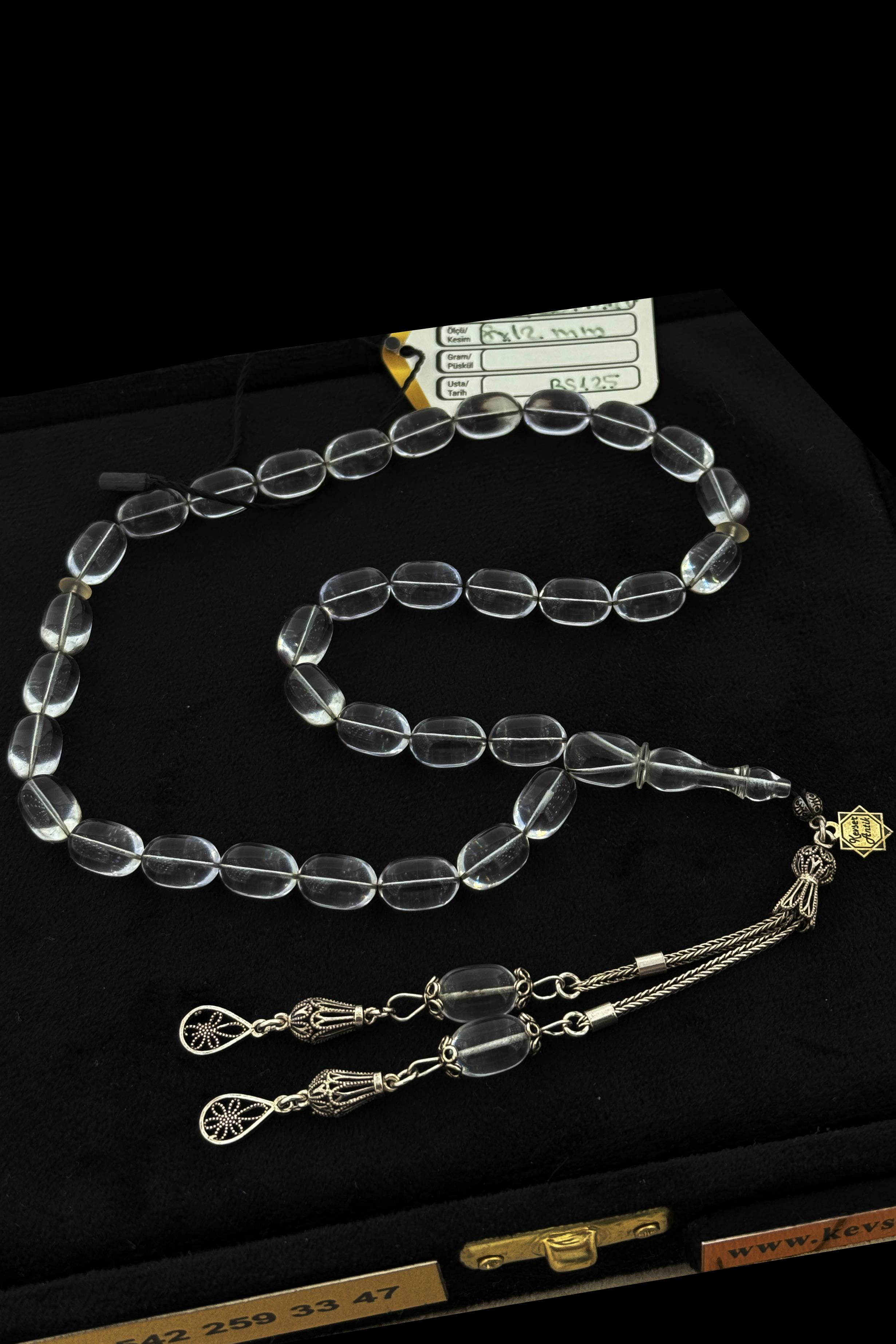 Şeffaf Ateş Kehribar TesbihŞeffaf Ateş Kehribar Tesbih - Kevser AntikSıkma-Ateş Kehribar Tesbihler