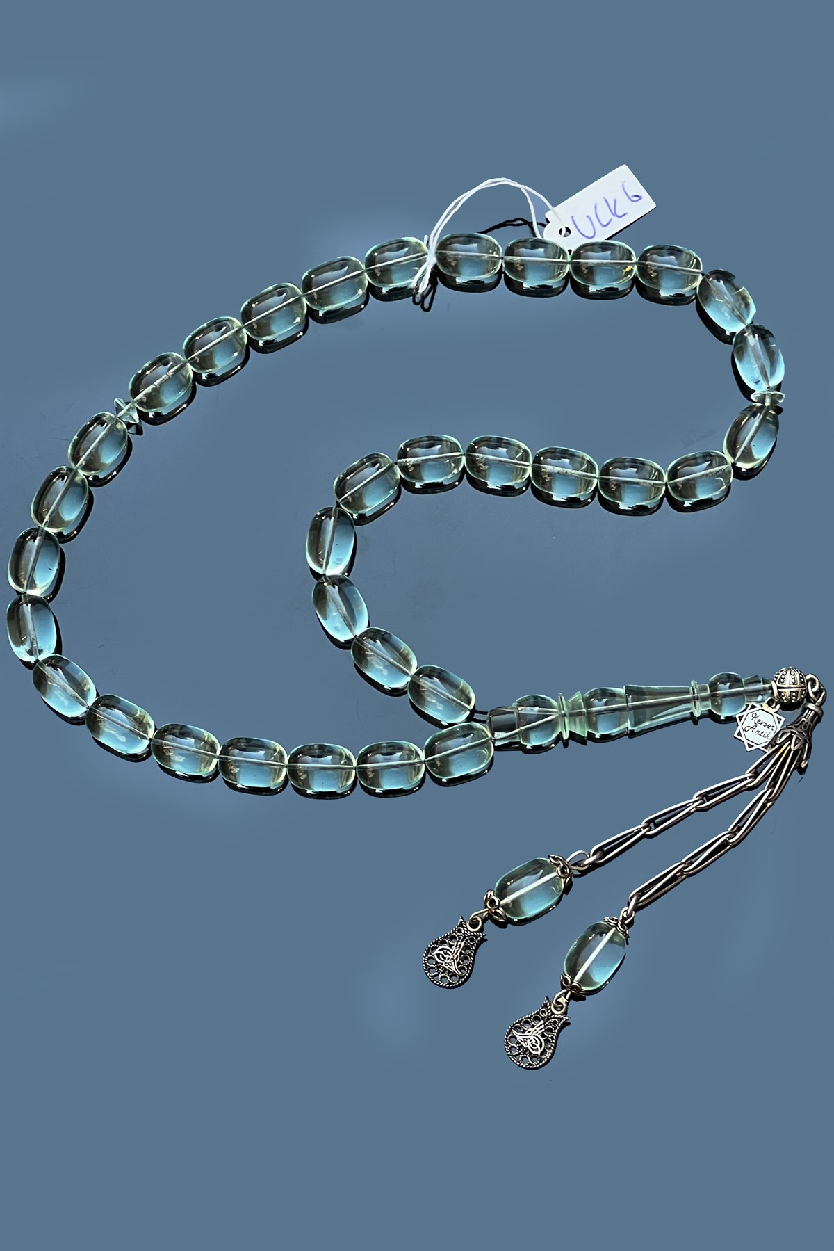 Şeffaf delim uçak camı tesbihiŞeffaf delim uçak camı tesbihi - Kevser AntikSıkma-Ateş Kehribar Tesbihler