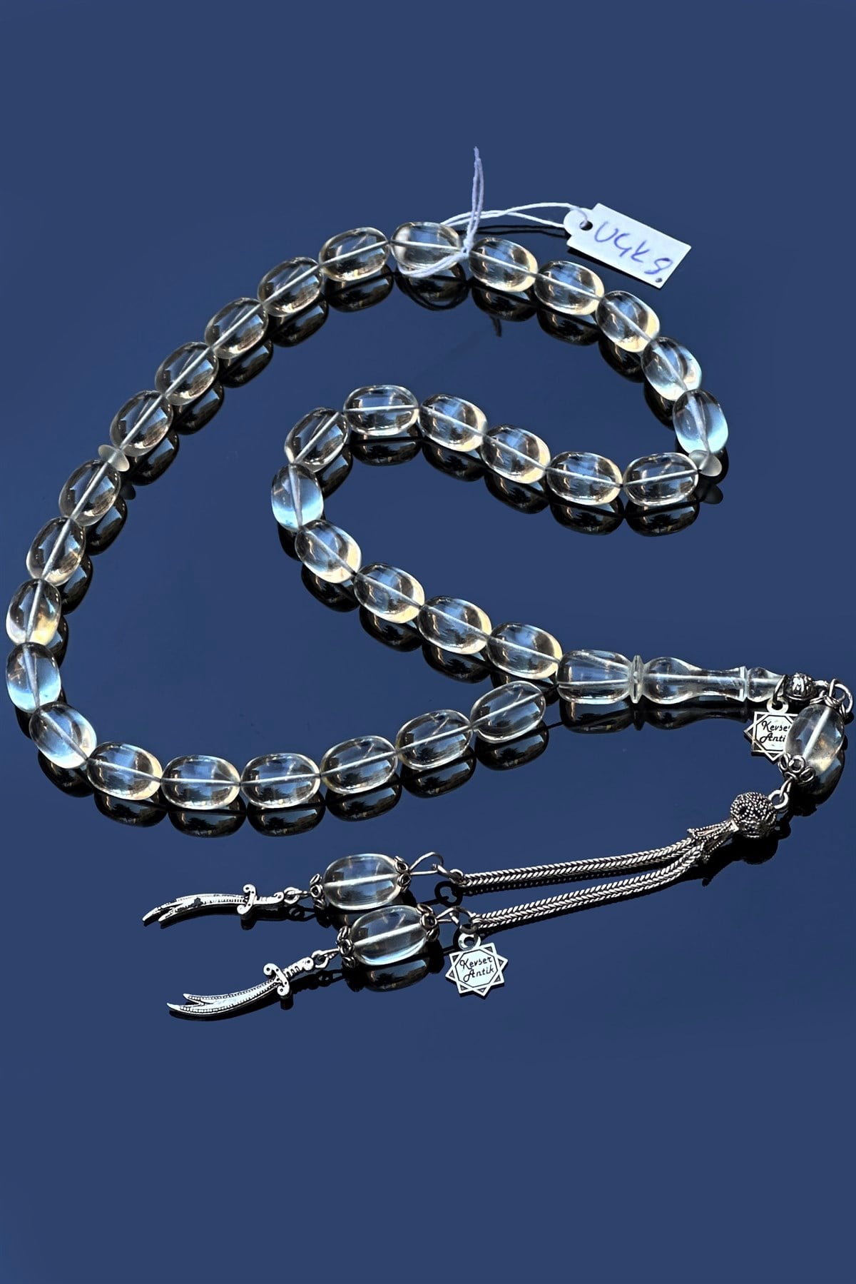 Şeffaf delim uçak camı tesbihiŞeffaf delim uçak camı tesbihi - Kevser AntikSıkma-Ateş Kehribar Tesbihler