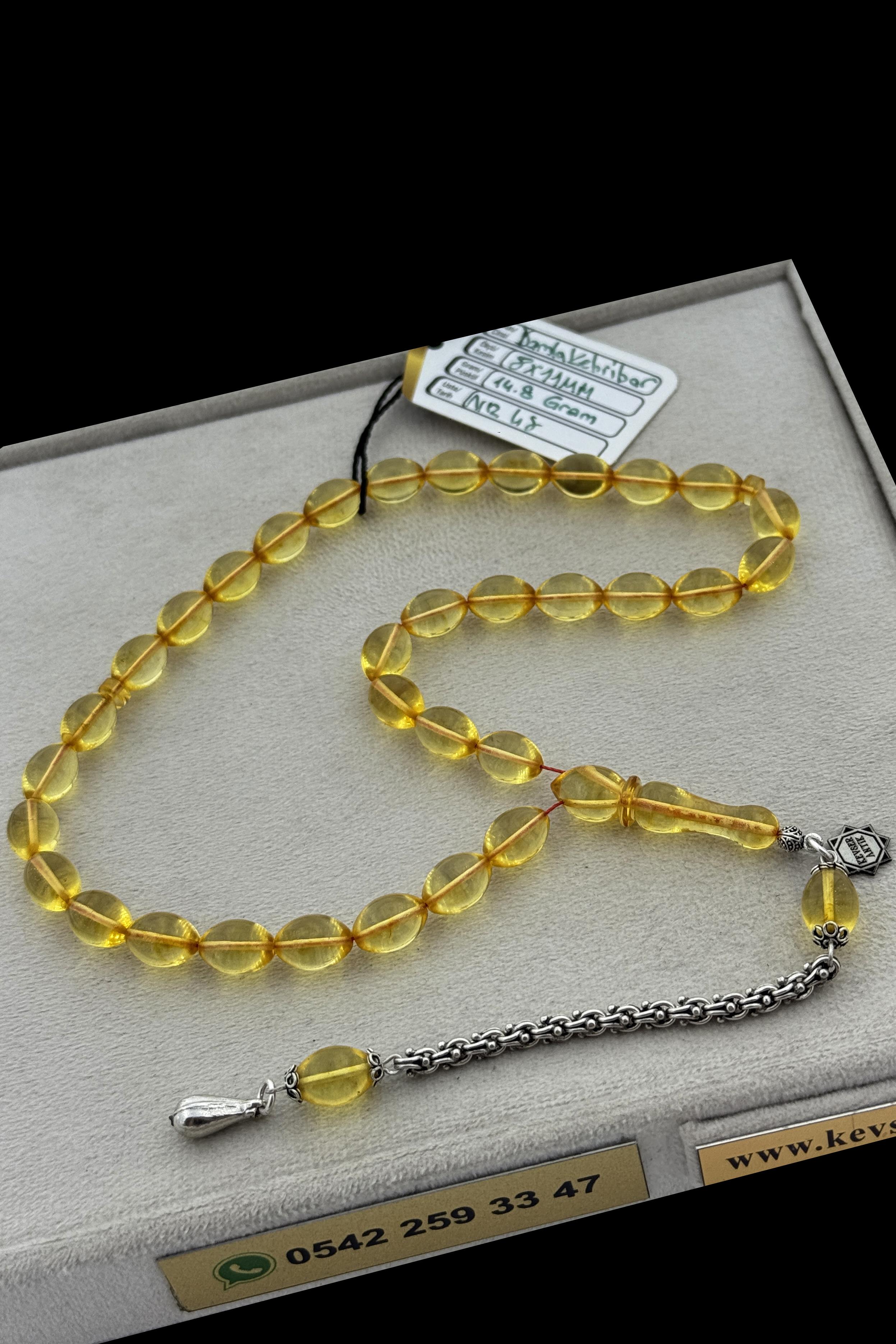 Şeffaf Kaliningrad Amber TesbihŞeffaf Kaliningrad Amber Tesbih - Kevser AntikDamla Kehribar Tesbihler